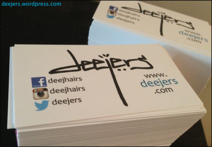 deejers business cards displaying all social media and contact information.